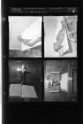 Man killed in a wreck at coroner's office (Disclaimer: Body Pictured); Pulpit with bible and a cross with the initials "rhs" (4 Negatives) (December 20, 1954) [Sleeve 71, Folder d, Box 5]